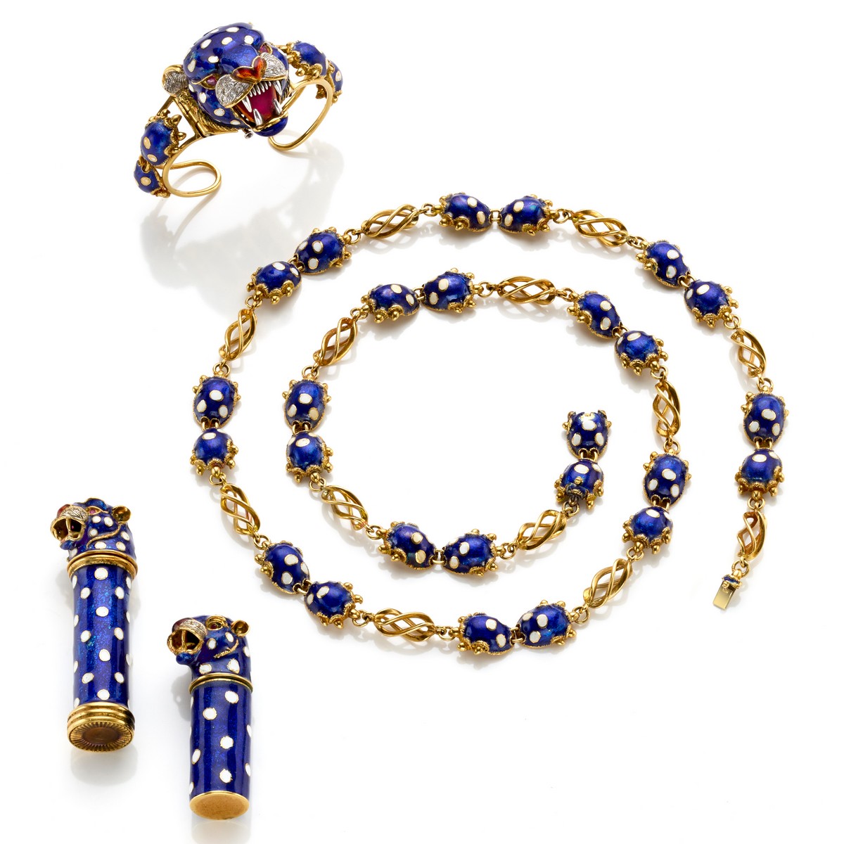 Set Frascarolo con collana lunga con spilla a testa di leopardo, accendino e portarossetto.